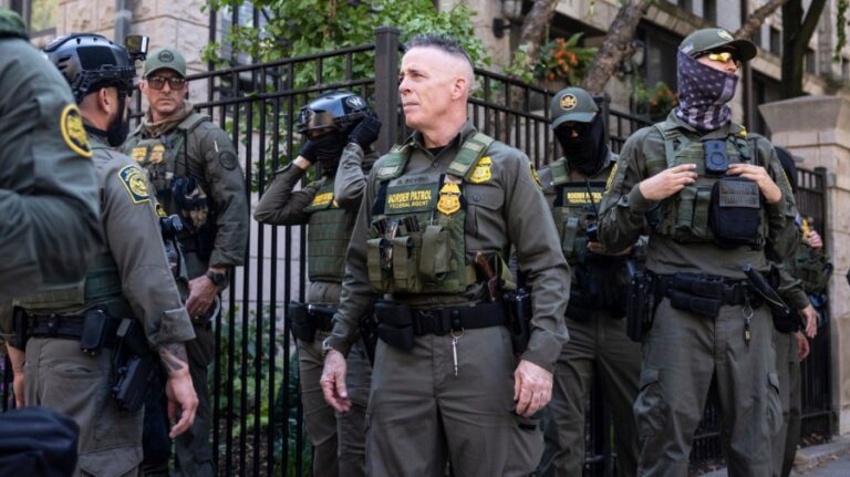 Masked federal agents patrol downtown Chicago
