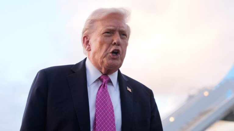 Trump signs order expanding auto tariff relief